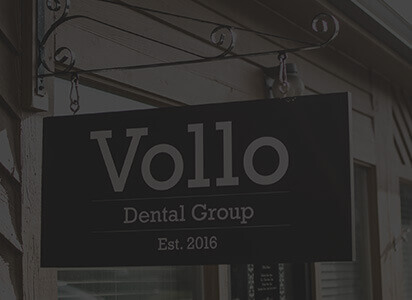 Outdoor sign reading Vollo Dental Group Established 2016