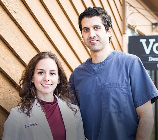 Rochester New York dentists Doctor Joseph Vollo and Doctor Katherine Vollo smiling together